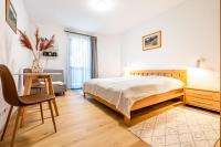 A bed or beds in a room at Apartment Harmony - Tatranska Lomnica, Javorinka