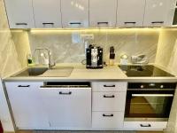 A kitchen or kitchenette at Apartment Harmony - Tatranska Lomnica, Javorinka