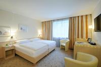 Postel nebo postele na pokoji v ubytování Hotel Scherer