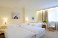 Postel nebo postele na pokoji v ubytování Hotel Scherer