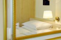 Postel nebo postele na pokoji v ubytování Hotel Scherer