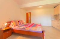 Postel nebo postele na pokoji v ubytování Apartments 4 Palme