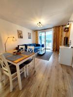 Posedenie v ubytovaní Apartament Włochatka z sauną fińską