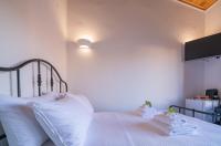 Posteľ alebo postele v izbe v ubytovaní Marthas DeLight Rooms