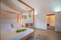 Posteľ alebo postele v izbe v ubytovaní Marthas DeLight Rooms