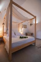 Posteľ alebo postele v izbe v ubytovaní Marthas DeLight Rooms