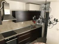 Kuchyňa alebo kuchynka v ubytovaní Figa Studio Apartman