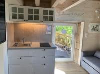 Kuchyňa alebo kuchynka v ubytovaní La petite maison d’Orphée