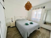 Posteľ alebo postele v izbe v ubytovaní Modern apartment with sea views in Corralejo