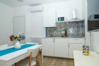 A kitchen or kitchenette at Villa Trani