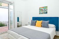 A bed or beds in a room at Villa Trani