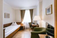 Łóżko lub łóżka w pokoju w obiekcie Seehotel Billroth