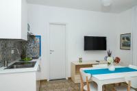 A television and/or entertainment centre at Villa Trani