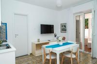 A television and/or entertainment centre at Villa Trani