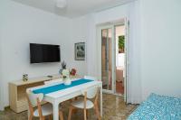 A television and/or entertainment centre at Villa Trani