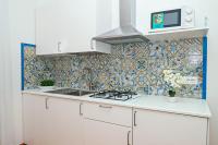 A kitchen or kitchenette at Villa Trani