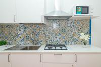 A kitchen or kitchenette at Villa Trani