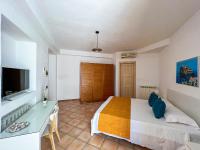 A bed or beds in a room at Villa Trani