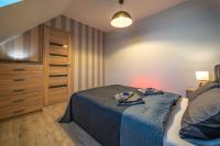 Posteľ alebo postele v izbe v ubytovaní Apartamenty Bunny Aparts
