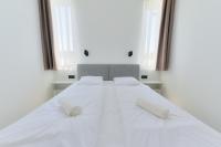 Posteľ alebo postele v izbe v ubytovaní Villa Oliver Zalakaros