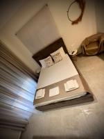 Posteľ alebo postele v izbe v ubytovaní Villa Maria apartments