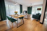 Televízia a/alebo spoločenská miestnosť v ubytovaní Apart Invest Centrum Park 18