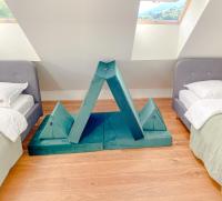 A bed or beds in a room at Superb Mýto Apartment