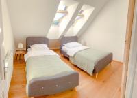 A bed or beds in a room at Superb Mýto Apartment