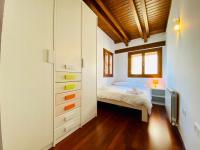 A bed or beds in a room at Casa Forn