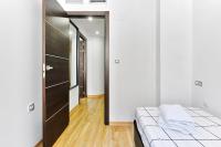 Postel nebo postele na pokoji v ubytování Wehaus - Exclusive & nordic style apartment in Murcia