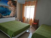Posteľ alebo postele v izbe v ubytovaní Serenella's House