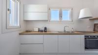 Kuchyňa alebo kuchynka v ubytovaní Elyos Apartments