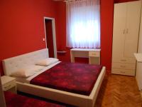 Postel nebo postele na pokoji v ubytování Apartments Mira