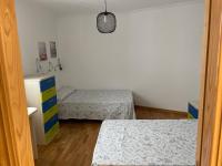 Postel nebo postele na pokoji v ubytování Apartamento vacacional foz