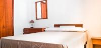 A bed or beds in a room at Sweet Room in Malaga Center "Homestay" - Habitación Alojamiento en Apartamento