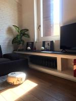 Televízia a/alebo spoločenská miestnosť v ubytovaní Cinquecento Loft