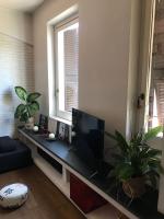 Televízia a/alebo spoločenská miestnosť v ubytovaní Cinquecento Loft