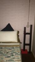 Posteľ alebo postele v izbe v ubytovaní Cinquecento Loft