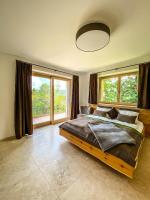 Posteľ alebo postele v izbe v ubytovaní Ferienvilla Joachimsberg mit Swimspa und Sauna