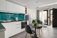 A kitchen or kitchenette at The City Gem Urban Apt.
