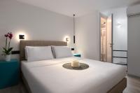 A bed or beds in a room at The City Gem Urban Apt.