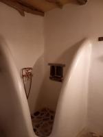TV a/nebo společenská místnost v ubytování Dimitrakis Guesthouse