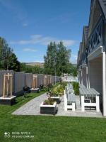 Vonkajšia záhrada v ubytovaní Całoroczny Ośrodek Wypoczynkowy COMFORT HOUSE