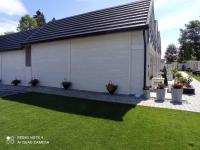 Vonkajšia záhrada v ubytovaní Całoroczny Ośrodek Wypoczynkowy COMFORT HOUSE