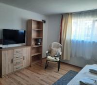 Telewizja i/lub zestaw kina domowego w obiekcie Opál Apartman