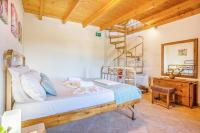 Postel nebo postele na pokoji v ubytování Olive Villas