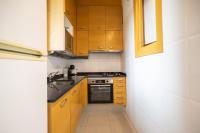 Kuchyň nebo kuchyňský kout v ubytování P2sal1071- Elegant Apartment in Carrer de Salinas