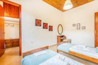Postel nebo postele na pokoji v ubytování Olive Villas