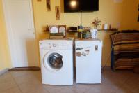 A kitchen or kitchenette at Bossanovolima studios