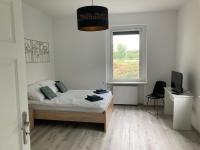 Posteľ alebo postele v izbe v ubytovaní Kamienica nad Maltą- Studio przy Malcie